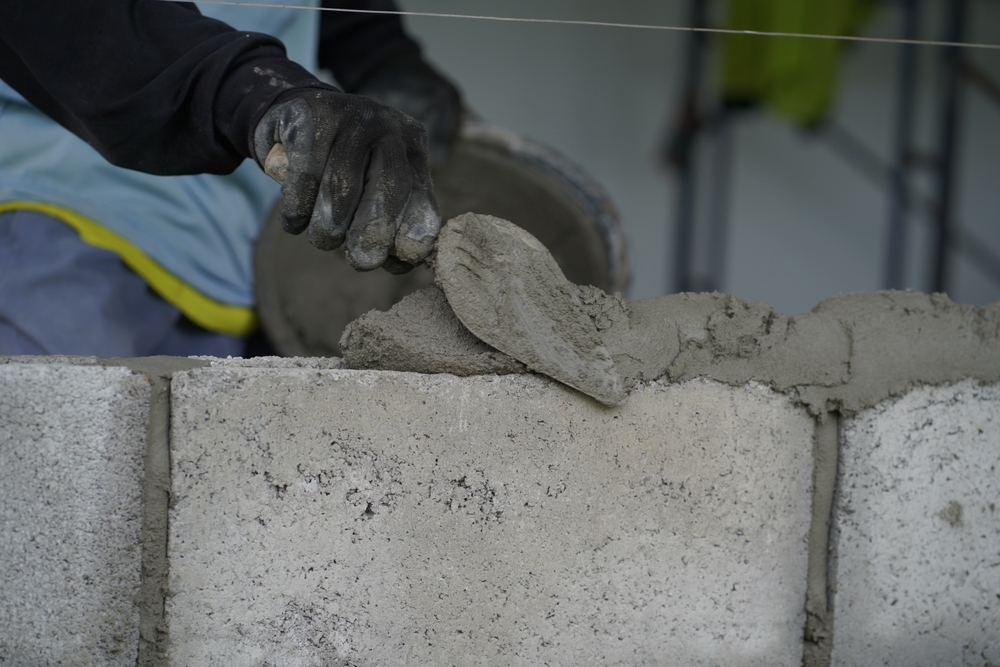 Masonry,Worker,Make,Concrete,Wall,By,Cement,Block,And,Plaster